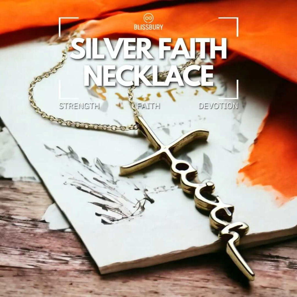 Silver Faith Necklace - Strength, Faith, Devotion, featuring a delicate chain and a pendant with intricate engravings.