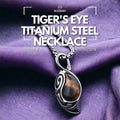 Tiger's Eye Titanium Steel Necklace - Courage, Luck, Protection, featuring a polished tiger's eye stone pendant on a silver